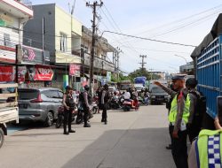 Satgas OMB Polres Pelabuhan Makassar Berikan Pengamanan Kampanye Pemilu Legislatif di Kecamatan Wajo