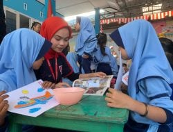 Alfamidi dan SGM Salurkan 33 Buku Bacaan di 33 Sekolah di Makassar 